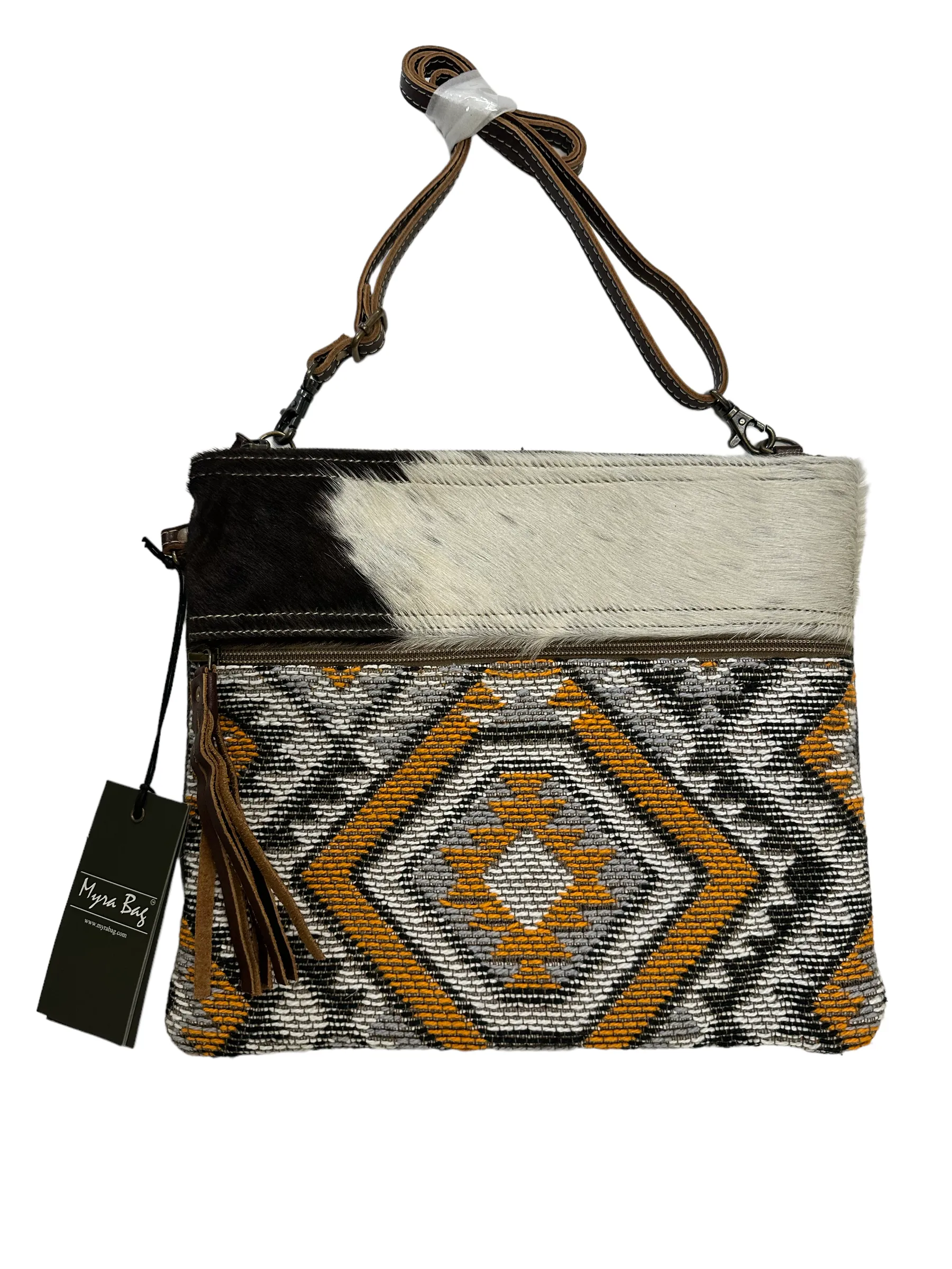 myra yellow and black cowhide canvas cross body  bag with tooled leather