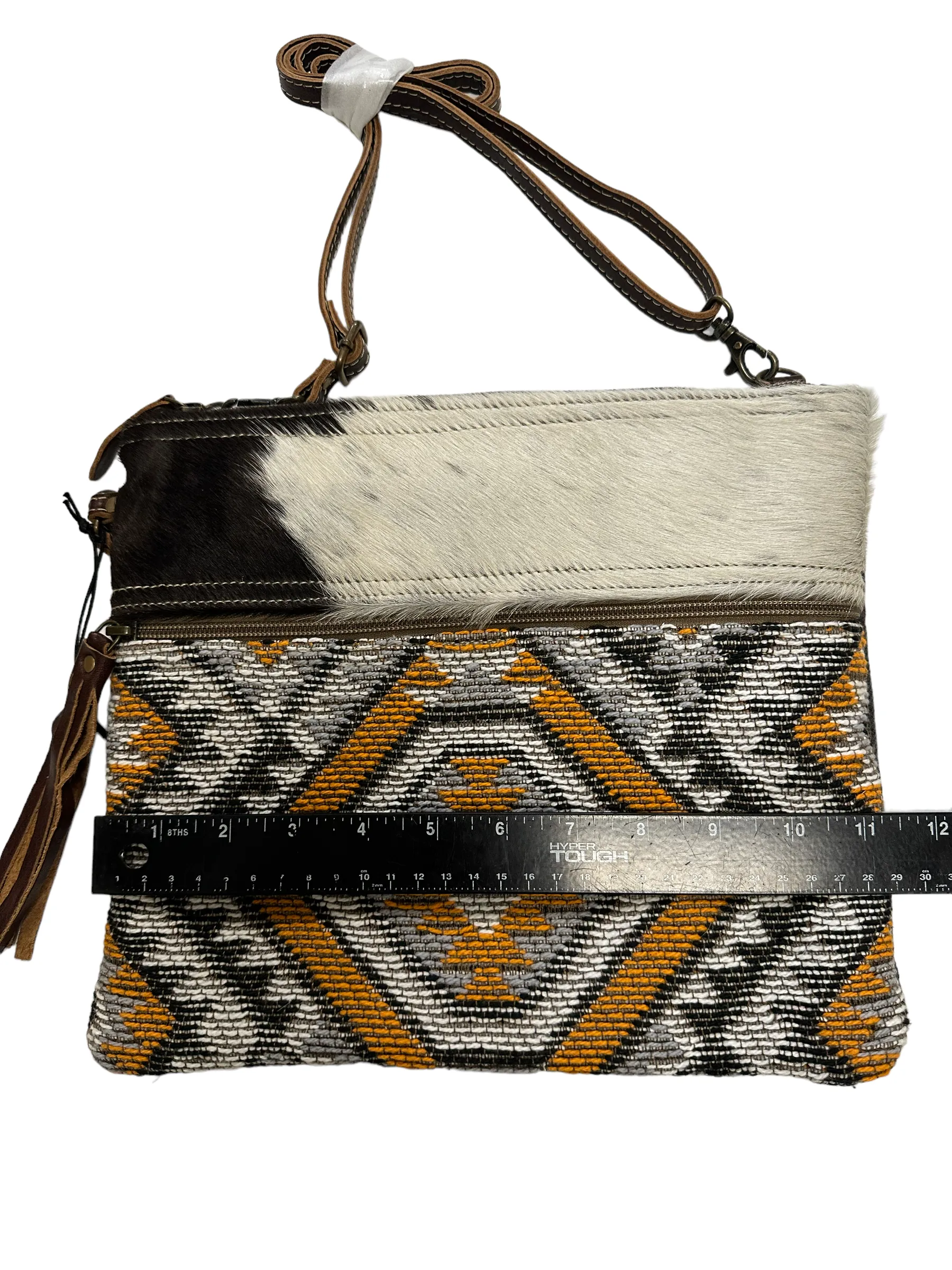 myra yellow and black cowhide canvas cross body  bag with tooled leather