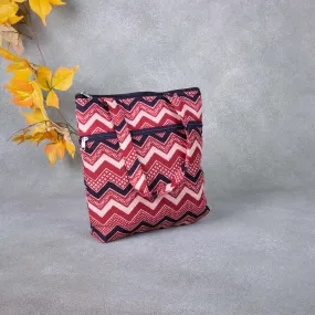 Small Handbag Maroon Colour with Black Zig Zag Design.